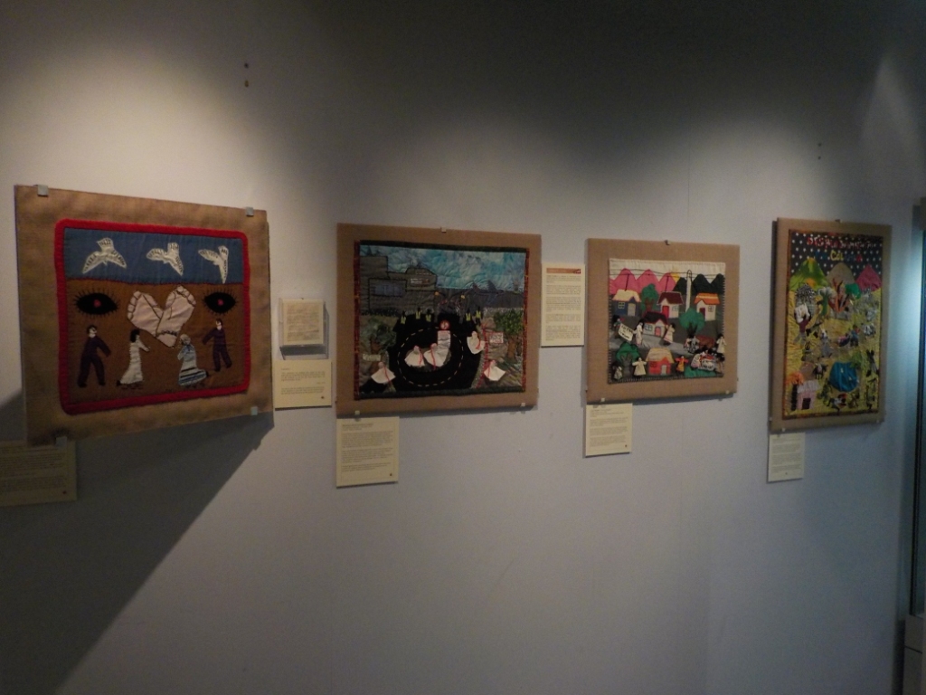 Arpilleras on display at the Tower Museum (June - December 2016). These four pieces were previously shown in the Victoria and Albert Museum, London, as part of 